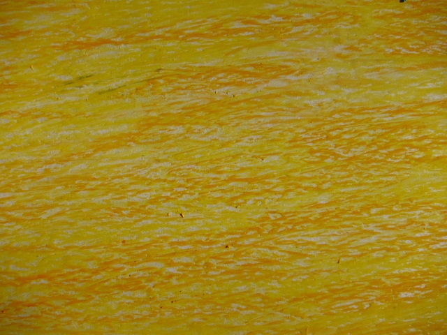 Texturierte gelbe und orangefarbene Oberfläche mit wavy Muster